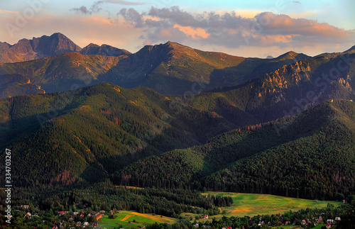 Fototapeta Naklejka Na Ścianę i Meble -  Panoramic view of High Tatra Mountains with Kasprowy Wierch, Czerwone Wierchy and Swinica peaks seen from Zakopane in Poland