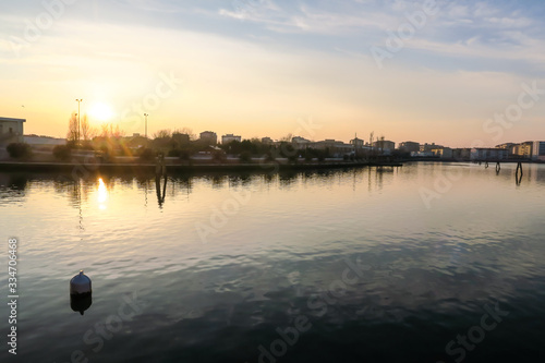 view of chiggia and sottomarina in venice at sunset photo