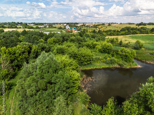 Picturesque summer countryside landscape whith pond in Russia from a height