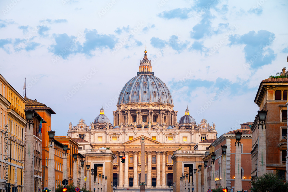 Fototapeta premium Sunrise over the St. Peters Basilica in Vatican City. Morning at the most famous landmark