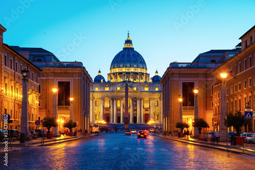 Illuminated St. Peters Basilica in Vatican City at night. Most famous square