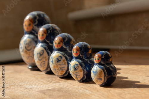 Bristol-March-2020-England -a close up view of five russian nesting dolls all facing out away from the open window