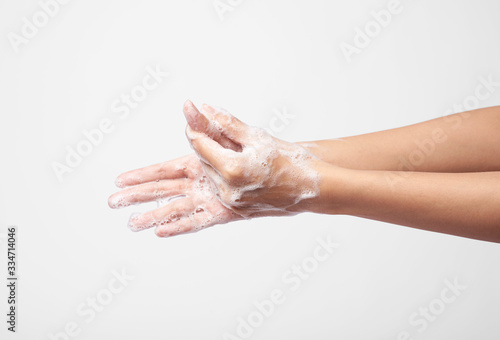 people use soap and washing hands on gray background. Concept Hygiene.