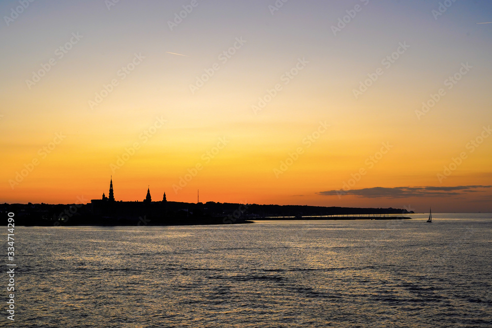 Silhouette of Kronborg castle (castle of Hamlet) in sunset sky Silhouette of Kronborg castle (castle of Hamlet) in sunset sky