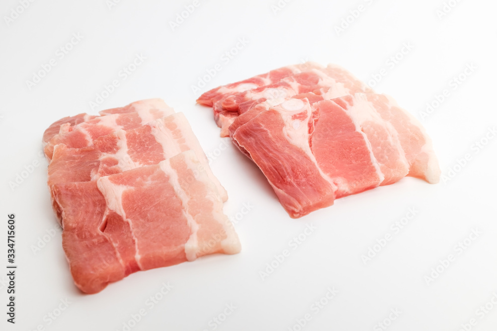 Sliced ​​pork belly on white background