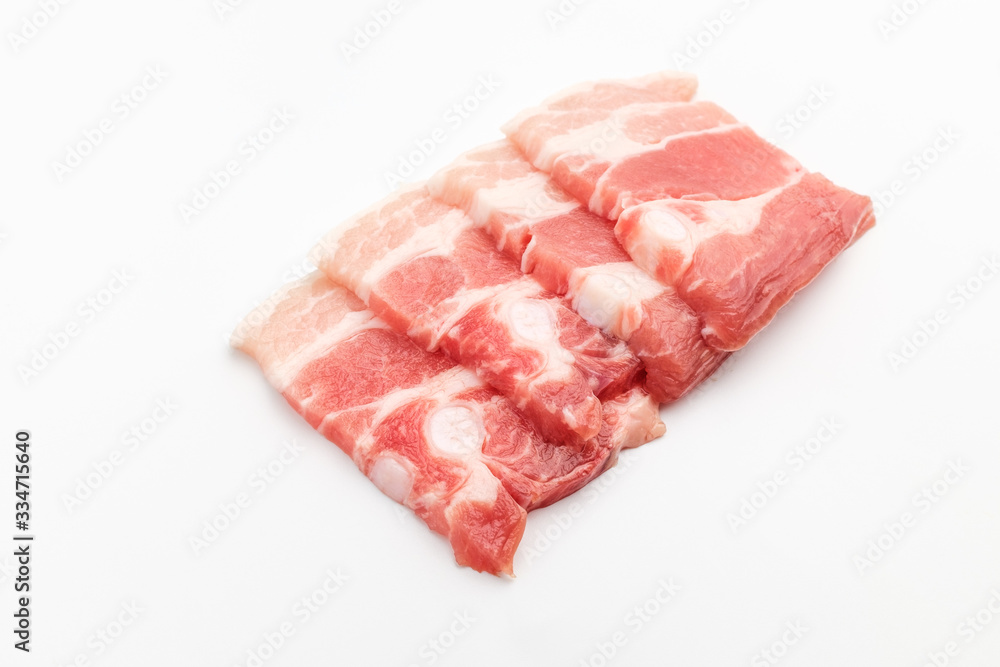 Sliced pork belly on white background Sliced pork belly on white background