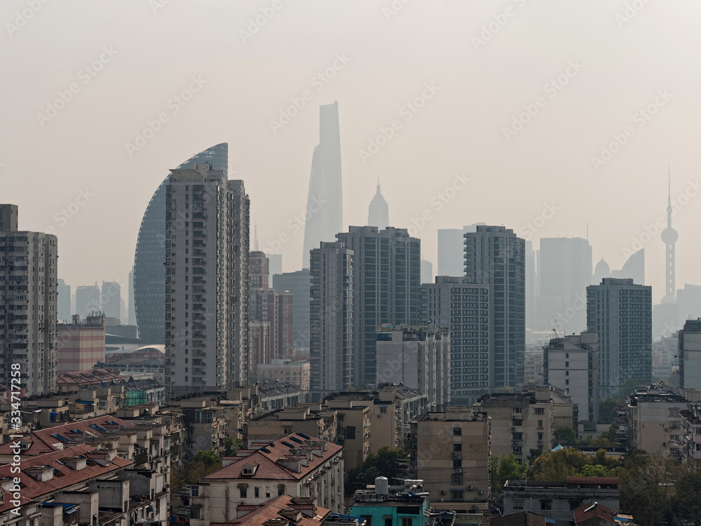 Shanghai cityscape in haze day with the silhouette background of Shanghai landmarks.