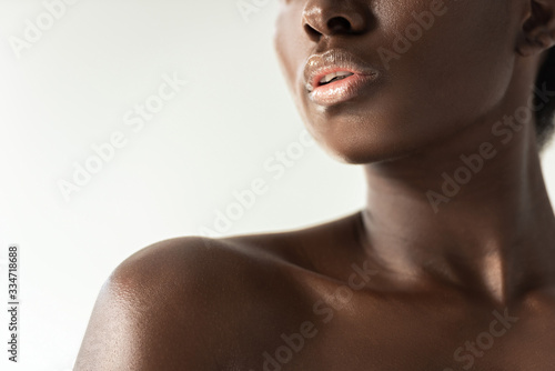 cropped view of tender nude african american girl isolated on grey