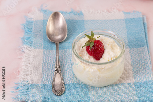 Strawberries in a glass jar photo