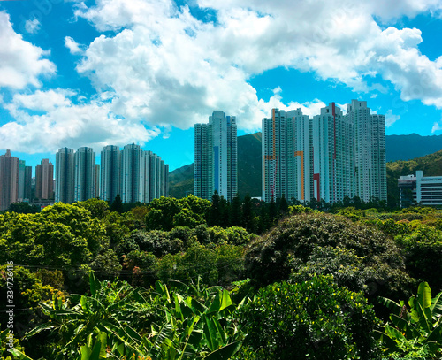 Skyscrapers in the midst of lush vegetation, one of the districts of Hong Kong 