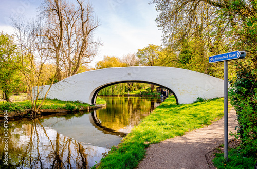 Lady Capel’s Bridge (Grand Union Canal Bridge No 163), in Cassiobury Park, Watfrord,  Hertfordshire, England. Made of whitewashed brick, circa 1800. Photo taken on April 2014. photo