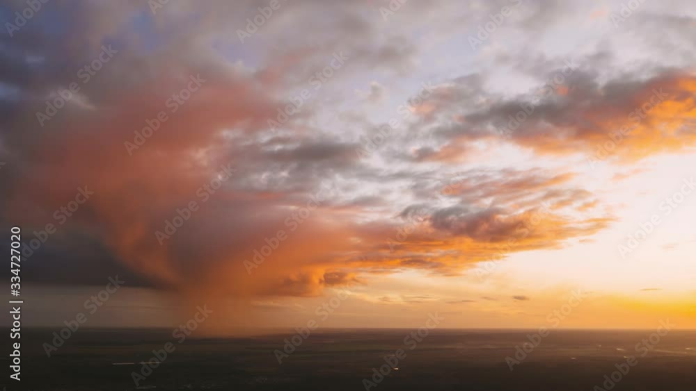 Sunset Bright Dramatic Sky. Scenic Colorful Sky At Sunset Dawn. Hyperlapse Sunset Bright Dramatic Sky. Scenic Colorful Sky At Sunset Dawn. Hyperlapse