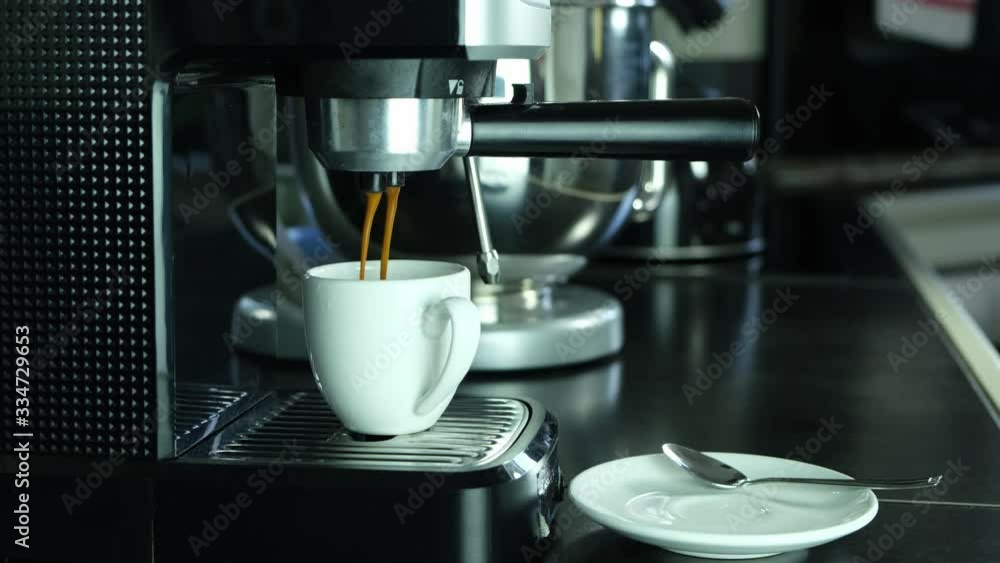 expresso coffee machine making black cafe hands close up 4k 50fps footage