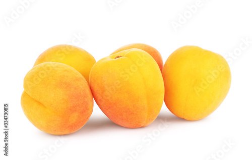 Fresh ripe whole, half and sliced apricot isolated on white background