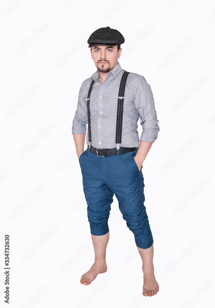 Handsome young man in retro style with cap isolated