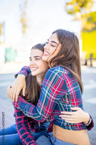 Two best female friends emb...