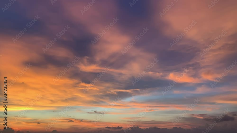 Beautiful pink golden sky during evening sunset on tropical island in Thailand. Amazing picture of natural phenomenon when sun sets over horizon and creates colorful landscape. Concept: scenery Beautiful pink golden sky during evening sunset on tropical island in Thailand. Amazing picture of natural phenomenon when sun sets over horizon and creates colorful landscape. Concept: scenery