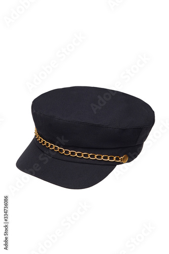 Subject shot of a blue peak cap with a golden chain under the visor. The stylish cloth cap is isolated on the white background.