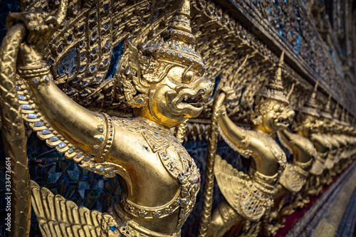 Golden Garuda statues at Wat Phra Kaew  inside the Grand Palace Complex  in Bangkok  Thailand.