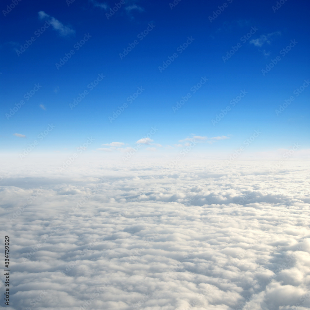 White clouds. View from the window of an airplane
