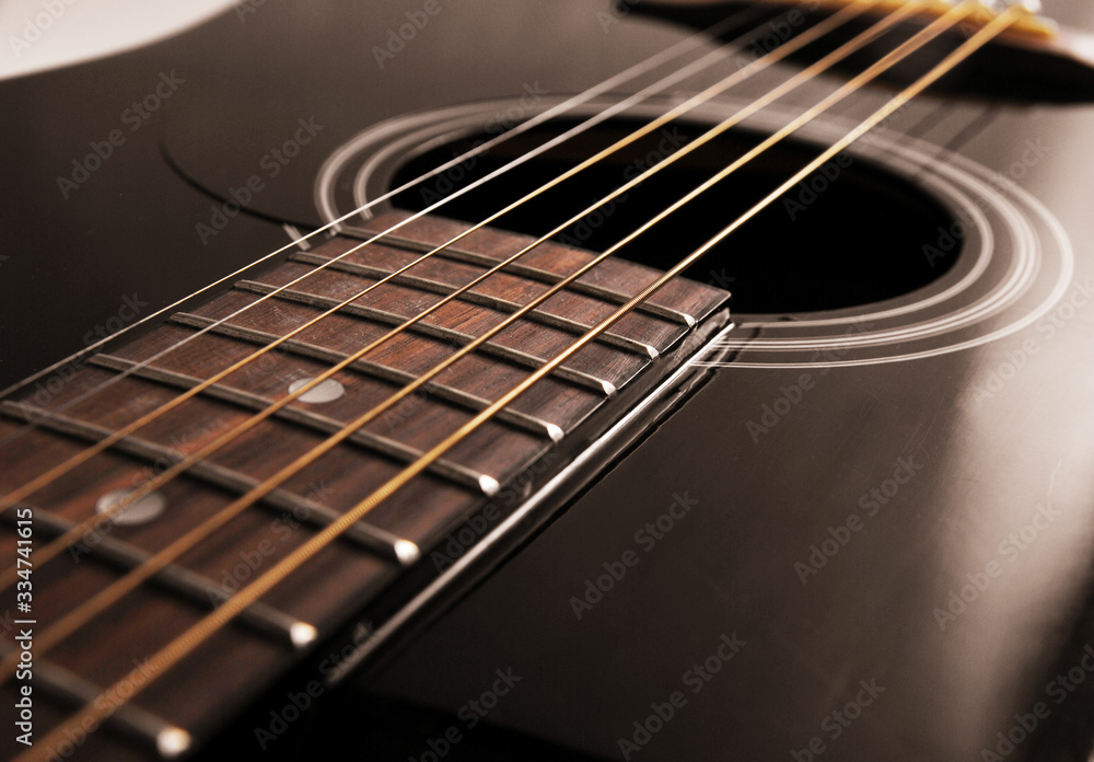 Fototapeta premium black acoustic guitar close up