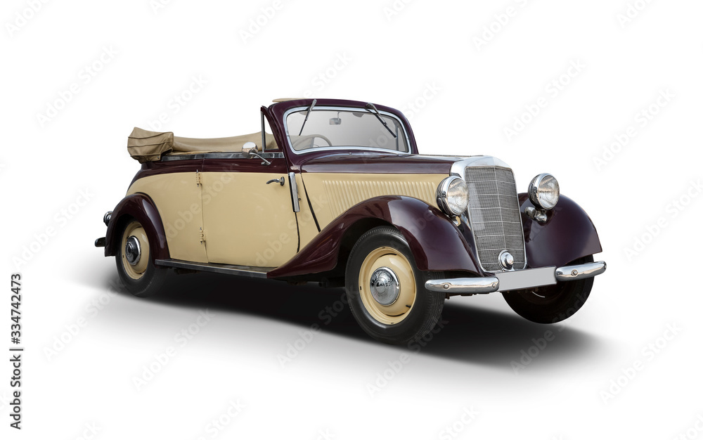 Antique German car isolated on white