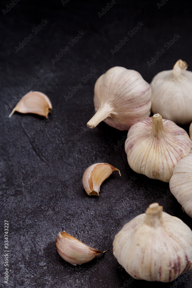 Garlic clove on dark background Garlic clove on dark background
