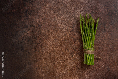 copy space with asparagus at rust background