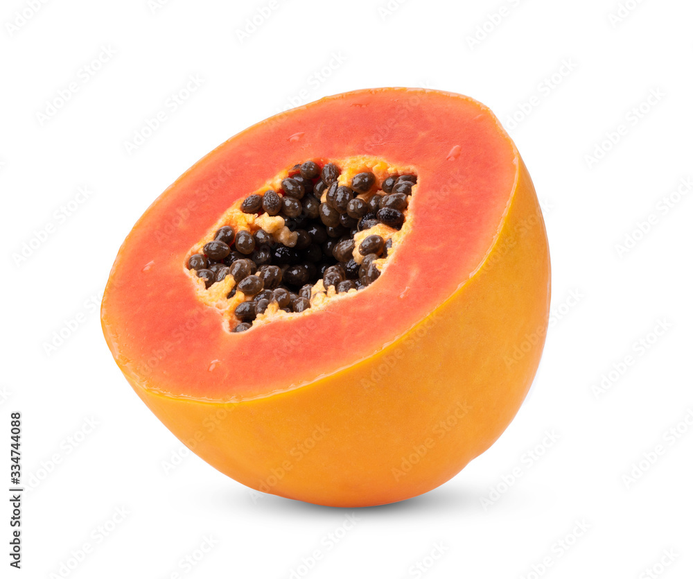 half ripe papaya fruit with seeds on white background half ripe papaya fruit with seeds on white background