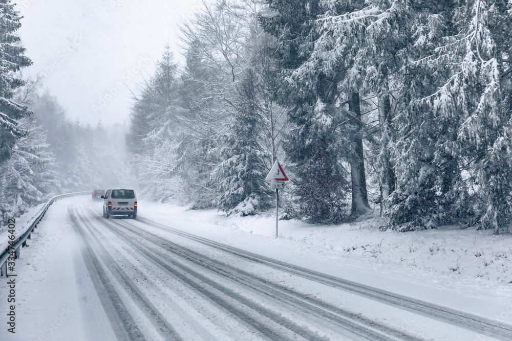 Fototapeta premium car on road in winter