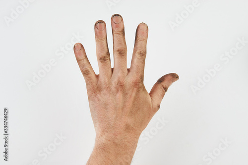 Dirty hand isolated on a white background with copy space © Gecko Studio