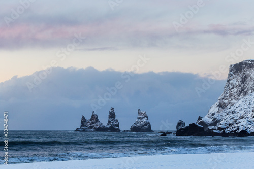 Iceland winter, trolls fingers rock, Vik village, sunset in Iceland