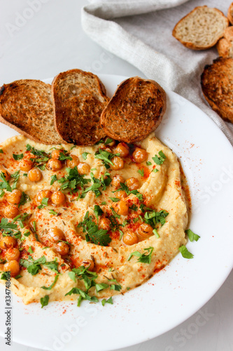 Chickpea hummus, made with croutons photo