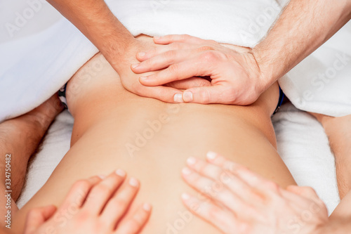 Man receiving back massage.