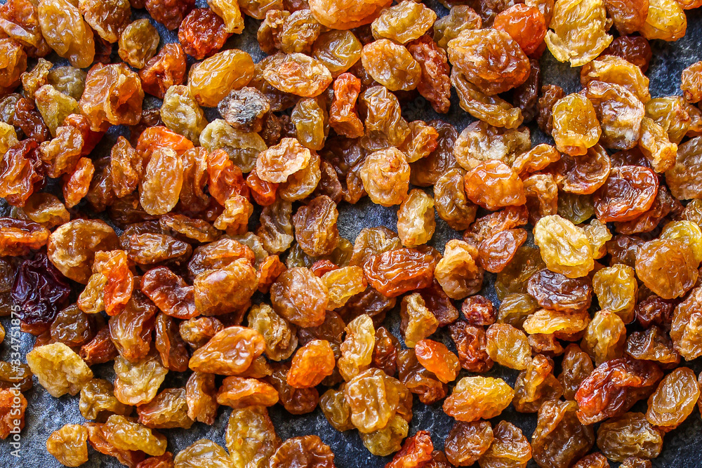 raisins, delicious dried grapes (fresh fruit vitamins) menu concept background. top view. copy space for text keto or paleo diet