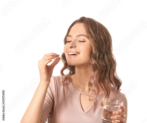 Young woman with fish oil o...
