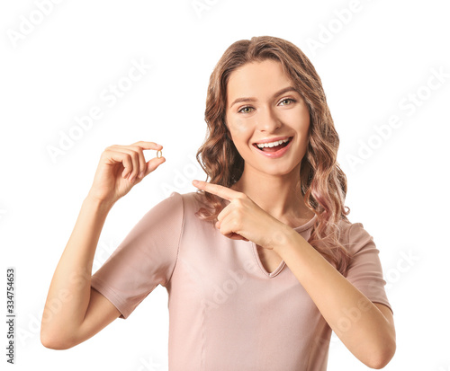 Young woman with fish oil o...