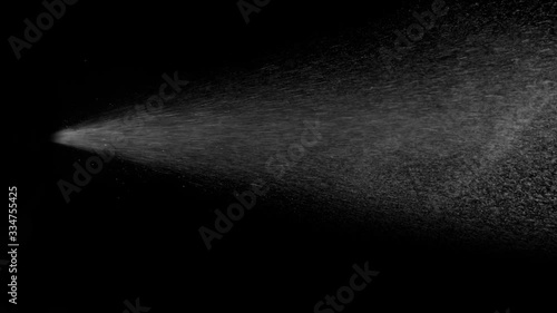 Super Slow Motion Shot of Spray Stream Isolated on Black Background at 1000 fps. photo