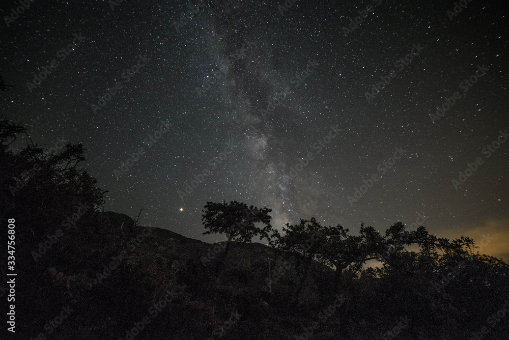 Colorful night landscape Milky Way over the mountains in the starry sky with hills in summer. Colorful night landscape Milky Way over the mountains in the starry sky with hills in summer.