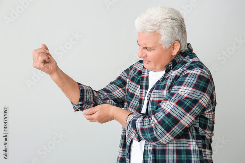 Senior man suffering from P...