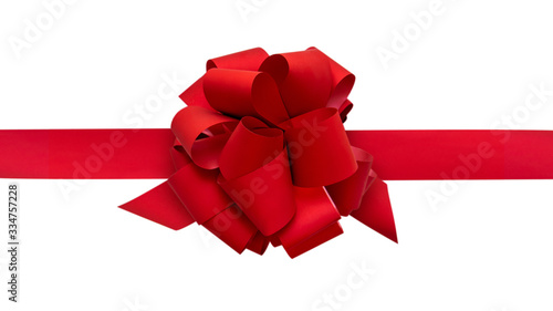 Big red bow with ribbon, on a white background, top view.