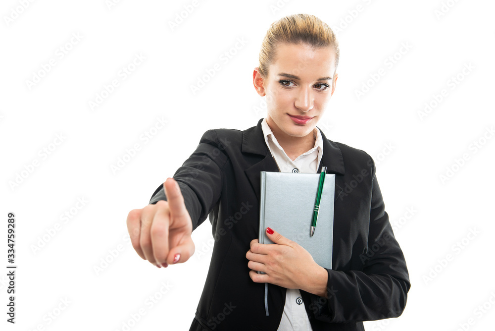 Young female assistant manager holding agenda using touchscreen