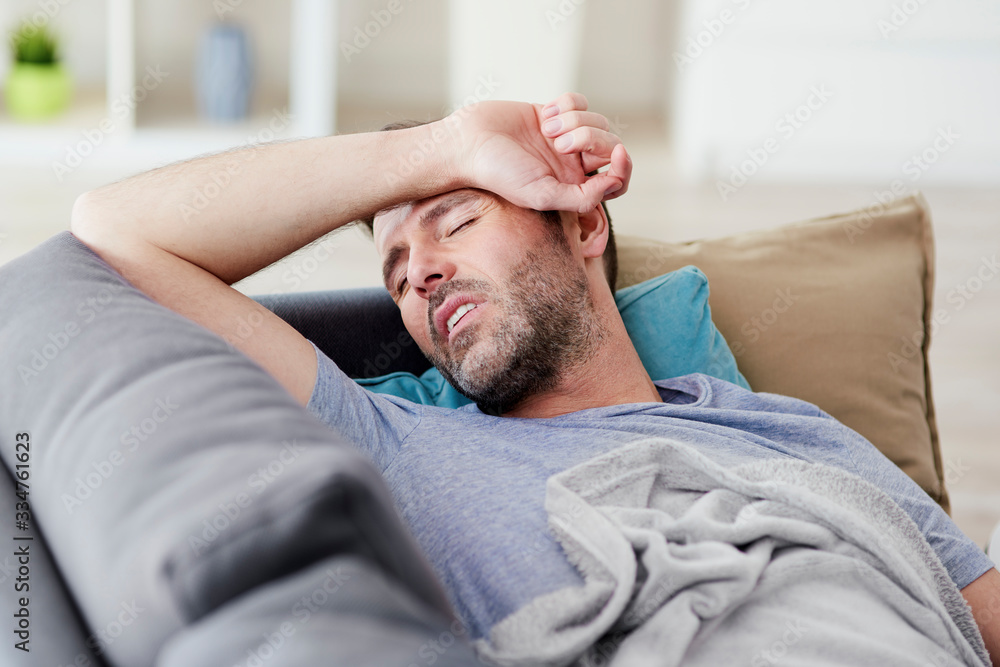 Ill man having cold at home Ill man having cold at home