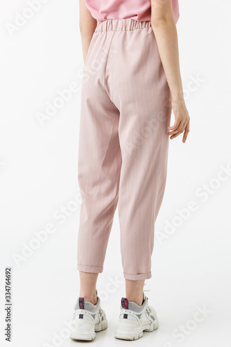 young girl in rose pants