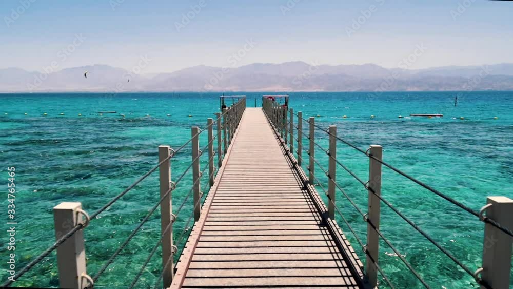 A push in shot of a dock at the Red Sea