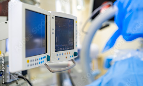 Mechanical ventilation equipment. Screen with results. Pneumonia diagnosting. Ventilation of the lungs with oxygen. COVID-19 and coronavirus identification. Pandemic.