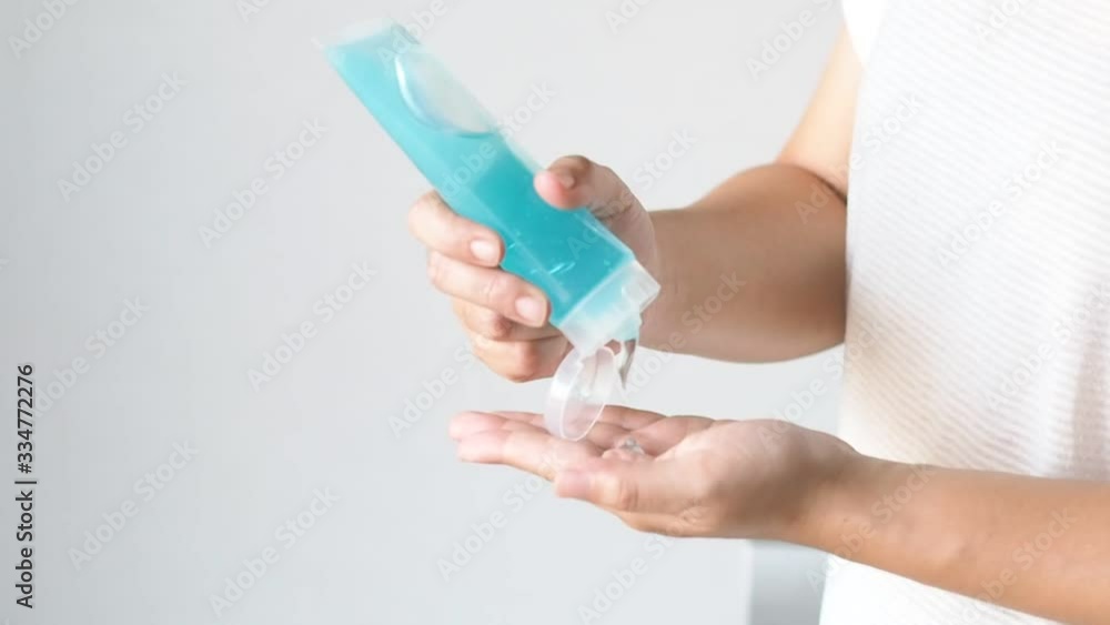 Soft Focus to Women washing hands with alcohol gel or antibacterial soap sanitizer after using a public restroom.Hygiene concept for avoid infections corona virus with copy space Soft Focus to Women washing hands with alcohol gel or antibacterial soap sanitizer after using a public restroom.Hygiene concept for avoid infections corona virus with copy space