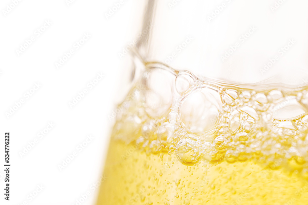 Carbonated drink close-up. Beer, lemonade. Detailed closeup. Bubbles in a liquid. Carbonated drink close-up. Beer, lemonade. Detailed closeup. Bubbles in a liquid.