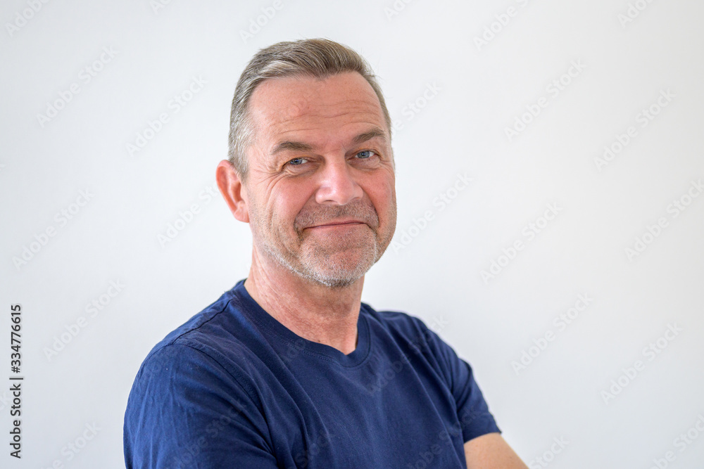Smiling friendly attractive middle-aged man Smiling friendly attractive middle-aged man
