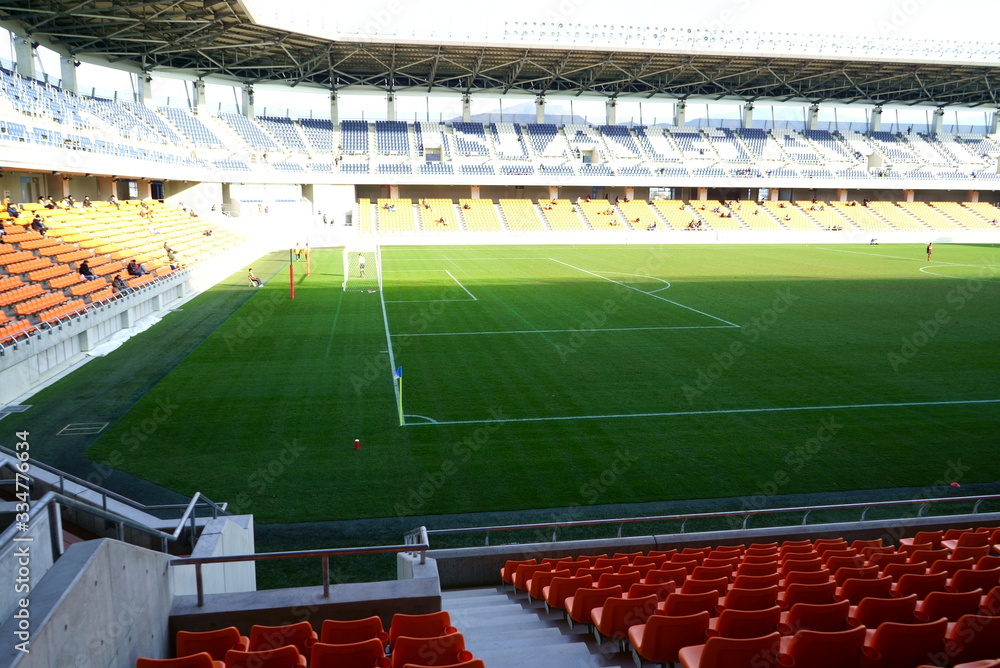 Fototapeta premium Bokeh image of a soccer stadium